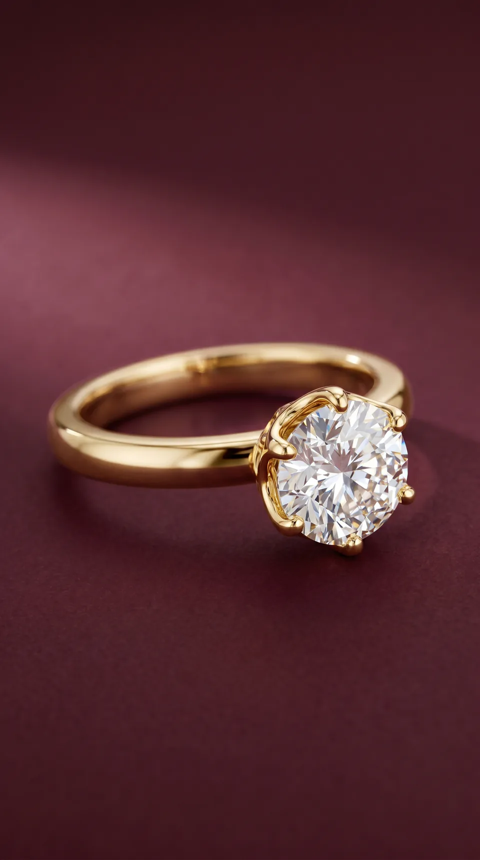 Custom round eight-prong engagement ring by Miruu